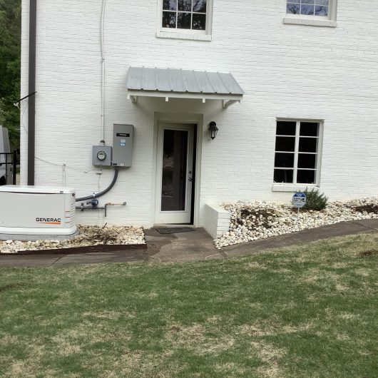 a large lawn in front of a house