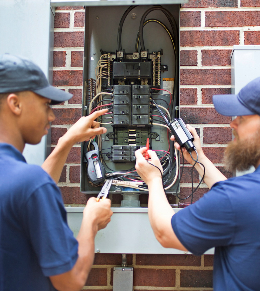 a man holding a control box