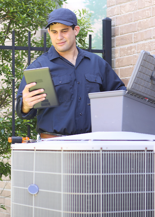 a man standing in front of a box