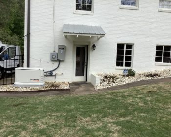 a house that is parked on the side of a building
