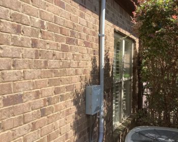 a close up of a brick building