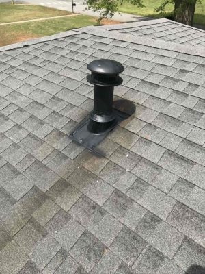 a sign on a brick sidewalk