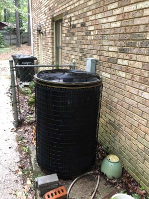 a pot on the side of a building